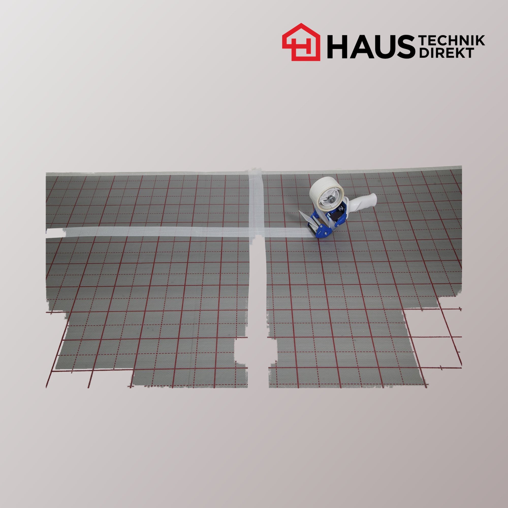 Handabroller im Einsatz beim Verkleben der Stöße von Tackerplatten einer Fußbodenheizung